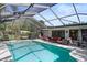 Inviting screened pool and patio area, perfect for outdoor entertaining at 6168 Arborea Dr, Lake Wales, FL 33898