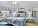 Relaxing main bedroom with a king-size bed and built-in window seat at 6168 Arborea Dr, Lake Wales, FL 33898