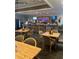 Bar and grill with tables and seating area at 680 Augusta Rd, Winter Haven, FL 33884