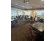 Spacious community room with ample seating and large windows at 680 Augusta Rd, Winter Haven, FL 33884
