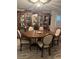 Formal dining room featuring an oval table and six chairs at 680 Augusta Rd, Winter Haven, FL 33884