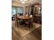 Elegant dining room with oval table, chairs and hardwood floors at 680 Augusta Rd, Winter Haven, FL 33884