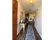 Bright entryway with hardwood floors and a decorative console table at 680 Augusta Rd, Winter Haven, FL 33884