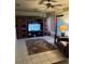 Inviting living room with built-in entertainment center and comfortable seating at 680 Augusta Rd, Winter Haven, FL 33884