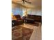 Spacious sunroom featuring comfortable leather seating and large windows at 680 Augusta Rd, Winter Haven, FL 33884