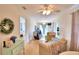 Open concept living space with comfortable furniture and hardwood floors at 4920 Old Lucerne Park Ne Rd, Winter Haven, FL 33881