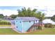 House with a deck overlooking the lake at 4920 Old Lucerne Park Ne Rd, Winter Haven, FL 33881