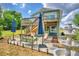 Relaxing patio with seating area, fountain, and umbrellas at 4920 Old Lucerne Park Ne Rd, Winter Haven, FL 33881