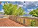 Lake view deck with wooden railings and bamboo at 4920 Old Lucerne Park Ne Rd, Winter Haven, FL 33881