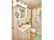 Bright bathroom with white vanity, shower/tub combo, and updated fixtures at 4920 Old Lucerne Park Ne Rd, Winter Haven, FL 33881