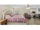 Large Primary bedroom with king bed and relaxing sitting area at 1396 Lucerne Loop Ne Rd, Winter Haven, FL 33881