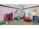 bedroom with house bed, beanbag chair, and built-in shelving at 1396 Lucerne Loop Ne Rd, Winter Haven, FL 33881