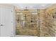 Spacious walk-in shower with glass enclosure and tiled walls at 1396 Lucerne Loop Ne Rd, Winter Haven, FL 33881