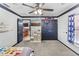 bedroom with fun decor and access to adjacent room at 1396 Lucerne Loop Ne Rd, Winter Haven, FL 33881