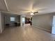 Open concept living room, kitchen, and dining area at 152 E Grove Dr, Haines City, FL 33844