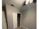 Bedroom with sliding door closet and tile floor at 152 E Grove Dr, Haines City, FL 33844