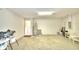 Garage with overhead door and ample space for storage at 1608 Forest Hills Ln, Haines City, FL 33844