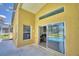 Bright patio with sliding glass doors at 1608 Forest Hills Ln, Haines City, FL 33844