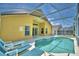 Relaxing pool area with lounge chairs at 1608 Forest Hills Ln, Haines City, FL 33844