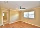 Spacious bedroom featuring hardwood floors and a ceiling fan at 1950 El Paso Trl, Bartow, FL 33830