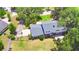 Aerial view of house, large backyard, and basketball court at 1950 El Paso Trl, Bartow, FL 33830