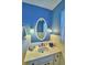 Bathroom vanity with sink and mirror at 1950 El Paso Trl, Bartow, FL 33830