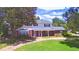 Two-story house with brick and white siding, large yard at 1950 El Paso Trl, Bartow, FL 33830