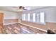 Living room with hardwood floors and window at 1950 El Paso Trl, Bartow, FL 33830