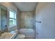 Clean bathroom with bathtub, shower, and granite vanity at 4073 Tullamore Ln, Auburndale, FL 33823