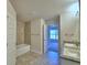 Bathroom with double vanity and garden tub at 4073 Tullamore Ln, Auburndale, FL 33823
