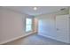 Bright bedroom with carpet and large window at 4073 Tullamore Ln, Auburndale, FL 33823