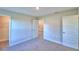 Bright bedroom with carpet flooring and walk-in closet at 4073 Tullamore Ln, Auburndale, FL 33823