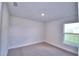Spacious bedroom with neutral walls and carpeted floor at 4073 Tullamore Ln, Auburndale, FL 33823