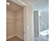 Large walk-in closet with wire shelving for organization at 4073 Tullamore Ln, Auburndale, FL 33823