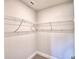 Large walk-in closet with wire shelving, providing ample storage space at 4073 Tullamore Ln, Auburndale, FL 33823