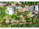 Property boasts a house, detached garage, and large lot at 12510 Lake Hatchineha Rd, Haines City, FL 33844