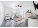 Elegant bedroom with a queen-size bed and built-in dresser at 12510 Lake Hatchineha Rd, Haines City, FL 33844