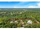 Aerial view of property showing two homes and large lot at 12510 Lake Hatchineha Rd, Haines City, FL 33844