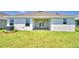 Home with covered patio and spacious backyard at 2123 Cartgate Lane, Winter Haven, FL 33884