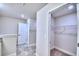 Spacious bathroom with walk in closet and tile floor at 2123 Cartgate Lane, Winter Haven, FL 33884