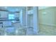 Modern kitchen with granite countertops and island at 2123 Cartgate Lane, Winter Haven, FL 33884