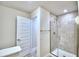 Bathroom with a walk-in shower and tile surround at 2123 Cartgate Lane, Winter Haven, FL 33884