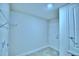 Laundry room with shelving and built-in cabinets at 2123 Cartgate Lane, Winter Haven, FL 33884