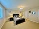 Bright bedroom with a queen-size bed and ample space at 1876 Eloise Cove Dr, Winter Haven, FL 33884