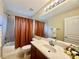 Bathroom with single vanity and tub/shower combo at 1876 Eloise Cove Dr, Winter Haven, FL 33884