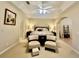 Main bedroom with ceiling fan, en-suite bathroom, and spacious closet at 1876 Eloise Cove Dr, Winter Haven, FL 33884