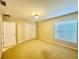 Spacious bedroom with double door closet and window at 1876 Eloise Cove Dr, Winter Haven, FL 33884