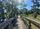 Scenic wooden boardwalk path over water at 1876 Eloise Cove Dr, Winter Haven, FL 33884