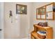 Bright entryway with mirror and small storage console at 318 Crescent Ridge Rd, Auburndale, FL 33823