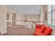 Spacious upper landing with a seating area at 318 Crescent Ridge Rd, Auburndale, FL 33823